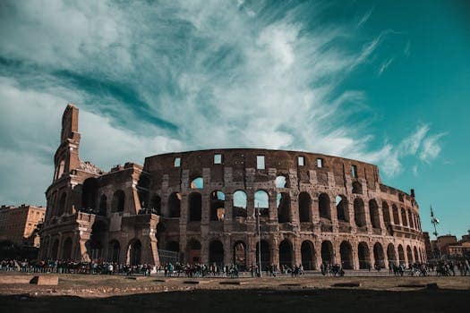 pexels-photo-2064827-2064827 Stunning view of the Colosseum in Rome showcasing its ancient architecture and historic grandeur.